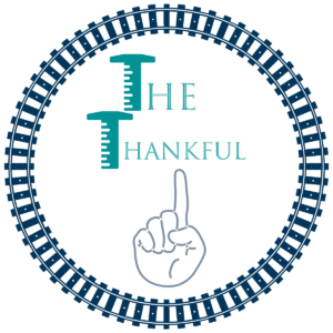 The Thankful One Logo - written within a circle